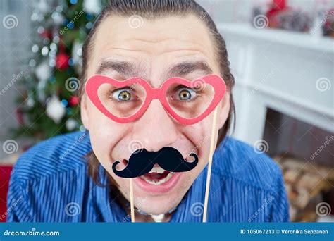Young Man Wearing Fake Mustaches and Glasses. Stock Image - Image of ...