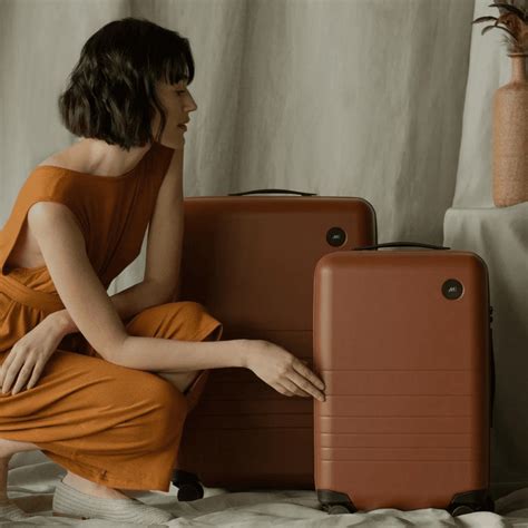 8 Chic Small Rolling Suitcases for Easy Travel - Brit + Co