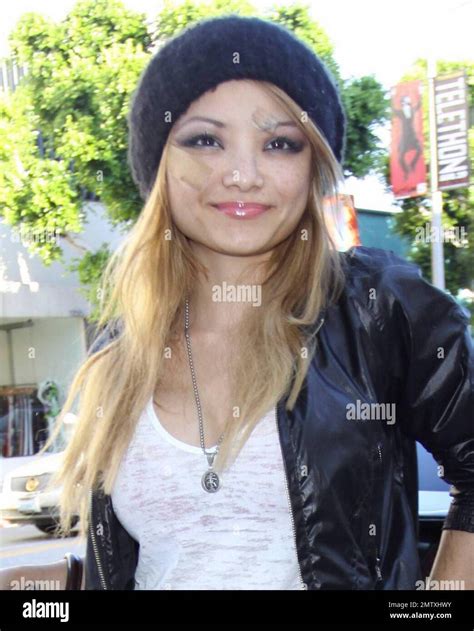 Tila Tequila (Tila Nguyen) poses for photographers as she leaves Kitson ...