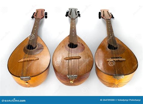 Three Old Mandolins. Baroque String Musical Instrument. Isolated On A ...