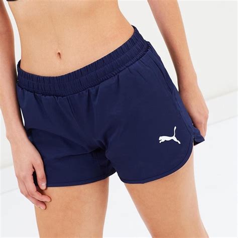 women's navy puma sports shorts size extra small in... - Depop