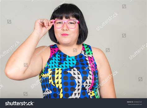 Fat Asian Woman Wearing Pink Glasses库存照片334683164 | Shutterstock