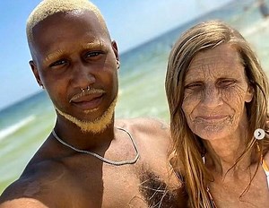 “He married a woman older than his dad!” 😳💍 When this young man introduced his bride, jaws dropped — she’s nearly his father’s age! Their wedding sparked outrage, but they silenced critics with bold honeymoon photos. See the couple everyone’s talking about in the comments below 👇 | Just About Interesting
