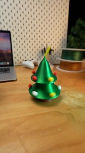 Spread the Christmas cheer everywhere! Christmas Tree (Rotating and Articulated) by AlanYan from MakerWorld: share.bambulab.com/xmasrotatingtree #bambulab #3dprinting #christmas | Bambu Lab 3D