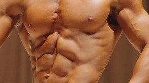 clip-18267103-professional-male-bodybuilder-demonstrating-masculine ...