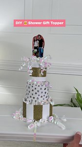 ✨Gift table goals✨ Personalize their bridal shower gift with this cute DIY cake topper 🥂 #BridalShower #LetsCelebrate #GiftWrapIdeas | American Greetings