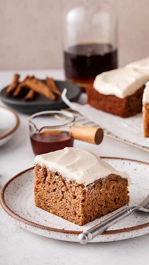 I am ~obsessed~ with this zucchini cake right now. It’s the perfect bridge from summer to fall, packed with crystallized ginger and topped with a maple cream cheese frosting. Give me a big piece, please! Search “zucchini cake with maple cream cheese frosting” on mybakingaddiction.com for the recipe! #zucchinirecipes #zucchinicake #fallbaking #feelslikefall #feelslikeautumn #fallrecipes #autumnrecipes | My Baking Addiction