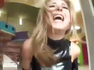 Clad in latex, a beautiful blonde slave girl cries out from