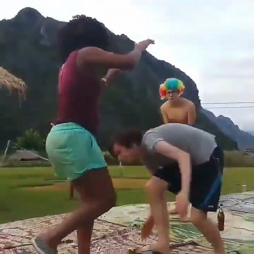 Woman beats guy in park with a headscissor