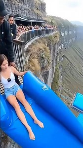 20-meter slide launch! She landed perfectly on the 18-meter cushion 😱💥 #CliffJump#ExtremeChallenge