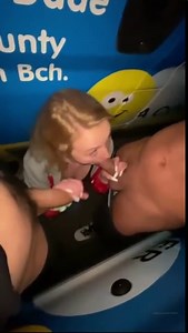 Blonde sucks two dicks in public