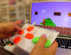 Makey Makey, A Kit for Connecting Everyday Objects to a Computer