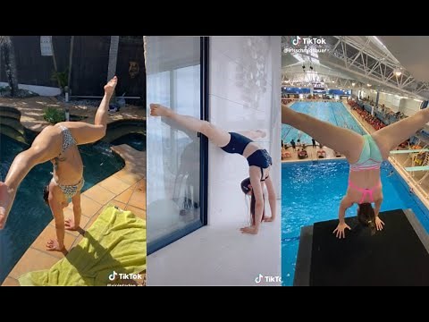 A video of a woman spreading her legs and making amazing movements