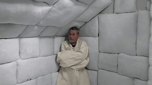 clip-1108694445-man-straight-jacket-asylum-mental-hospital-padded