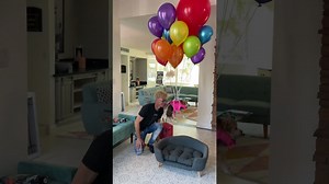 Dog Floats Away With Helium Balloons