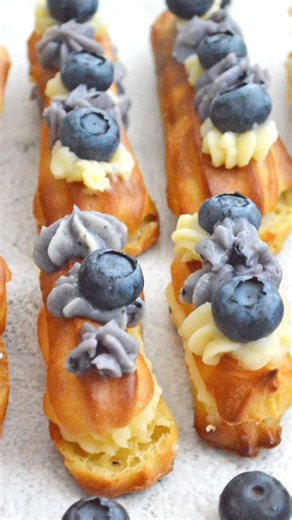 6.9K views · 16 reactions | Eclair with vanilla blueberry filling is the dessert no one can resist. * * * * * * Repost #reels #reteteculinare #reelsinstagram #video #dessert #dessertporn #dessertreels #cartederetete #tasty #eclairs #sweet #foodie #foodiereels #reelsvideo #reelsinsta #reelsviral #viralreels #viral #nomnom | Carte de Retete | Facebook