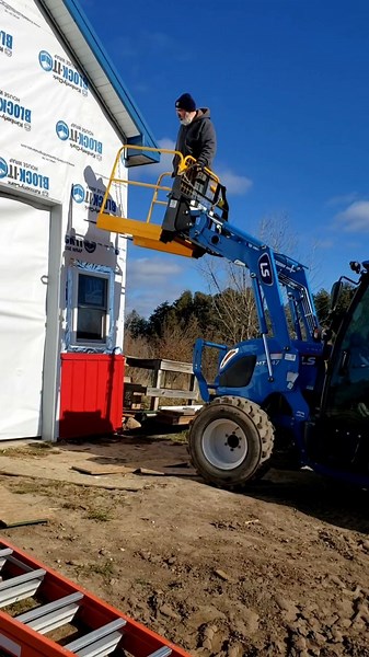 18 reactions | Testing out the forklift platform we got so the guys could keep going when we return the telehandler. It can't get the end wall tops, but it can reach the entire side walls. This may be handy for cleaning gutters and reaching the tops of fruit trees, too. #projecttime #lstractor #forkliftplatform | Common Sense Home | Facebook