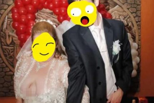 Bride's revealing dress slammed as she suffers awkward wardrobe malfunctio