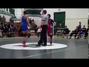 beautiful girl pins guy in a mixed wrestling match