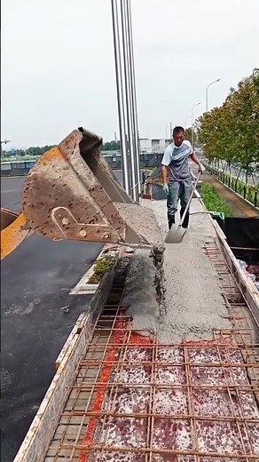 Concrete table top pouring process with a loader