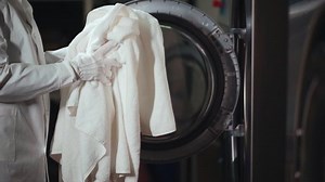 Female Worker Uniform Loading Bed Linen Stock Footage Video (100% Royalty-free) 1064765776 | Shutterstock