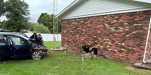 One hospitalized after car crashes into house in Powderly