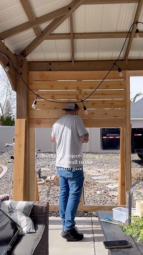 Vanessa Pulido on Instagram: "This was a quick couple hour project and it made such a huge impact! He made a frame out of 2X4’s and attached it to the gazebo, added a furring strip to the center where the cedar pickets meet, attach cedar pickets to the frame, and that’s it! . #weekendprojects #gazebo #outdoorproject #privacywall #patioinspo #outdoortv"