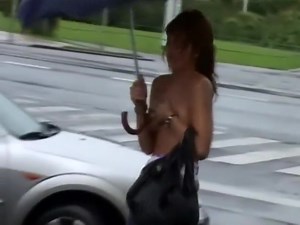 Guy pulls a blonde girl's top down