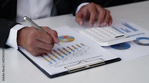 Close up of business hands are calculating number of financial budget of loan and accounting.