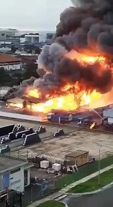WATCH: Explosions amid a massive industrial blaze at Jalan Buroh in Jurong, as seen in video circulating on social media. | CNA