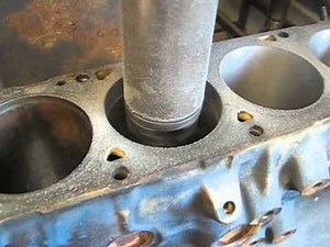 Engine rebuild - cylinder boring machine in action