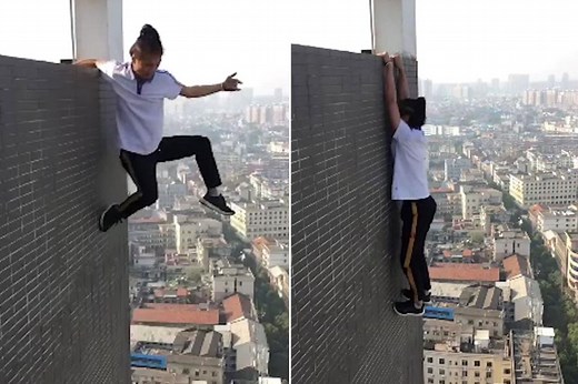 Daredevil lowers himself over the edge of the building to do iconic pull-ups
