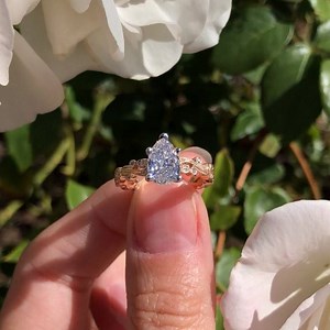 50 reactions |  I spy a Platinum Crown! This rose gold and pear shaped diamond sparkles even brighter in its Platinum Crown. Ring by @kirkkara, Platinum Jewelry Take Over. | Engagement 101 Magazine | Facebook