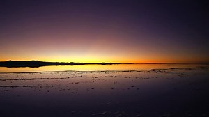 clip-1023209458-tourist-sunset-viewing-bolivian-landscape-salar-de