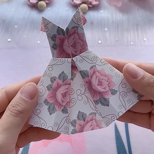 57K views · 788 reactions | Title: "Rose Princess Dress Origami: Exquisite Paper Craft Tutorial" Hashtags: - #RosePrincessDress - #OrigamiTutorial - #HandmadeDIY - #ParentChildCrafting - #SkirtOrigami - #OrigamiArt - #CraftingWithKids - #DIYProjects - #CreativeBonding - #CraftingFun paper craft | paper craft ideas | Facebook