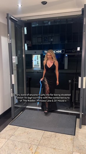 14K views · 191 reactions | what do you mean you feel sorry for me? I HAVE A LIGHT UP CANE?? ✨ video description Lucy is slaying through a hotel lobby wearing a floor length strappy black gown with lace cascading up one side. Her long blonde hair is curled and loose with volume at the top and she is wearing a silver tennis necklace. Lucy walks with her light up shepherds hook walking stick, and black platform sandal crocs x | Lucy may dawson | Facebook