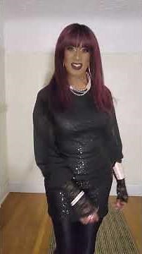 Crossdresser Modeling Black Sequin Dress with Shiny Nylons