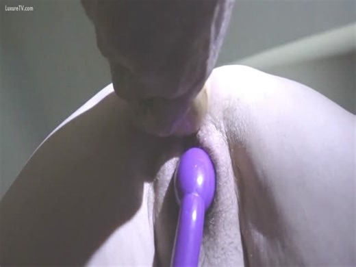 Wooden dildo inserted inside fat hairless pussy