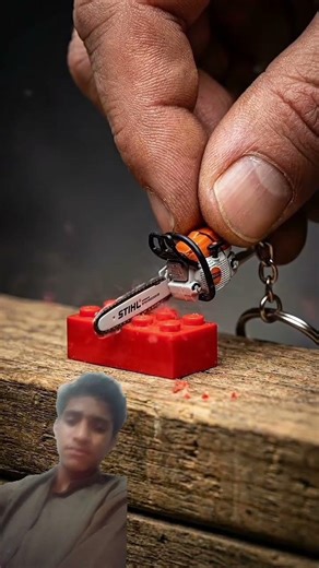 A bright plastic brick.A keychain-sized chainsaw.One bold experimental cut