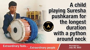 A child playing Suresha pushkaram for the longest duration with a...