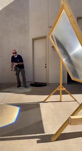 A demonstration of the giant magnifying glass. | Physics is Fun 2