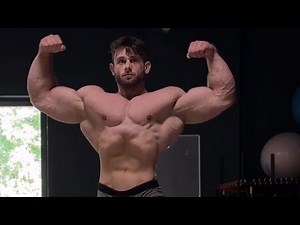 Handsome muscluor boy flexing muscle