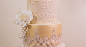 Paul introduces us to this beautiful contemporary wedding cake that incorporates many different techniques including damask stencilling, lace work, baroque-style touches, creating a brushed metallic effect and making beautiful sugar roses. He also creates some lovely, delicate naked leaves to bring the whole design together. This damask cake is perfect for weddings or for other special occasions such as an anniversary or significant birthday. This is aimed at intermediate to advance cake designe
