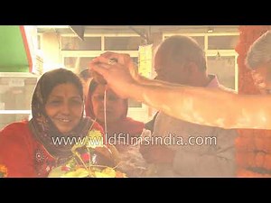 Indian women perform phallic religious Shivratri rituals at Sree Vinayak Temple in Delhi