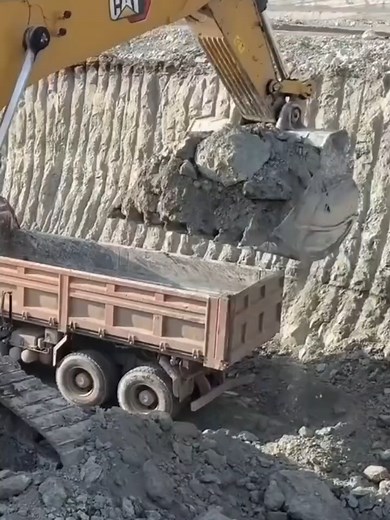 Caterpillar 6015B Excavator Loading Mercedes & MAN Trucks