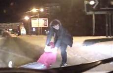 drunk russian dragged woman being road metro