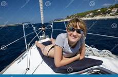sunbathing boat stock