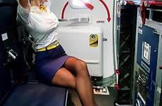 attendant attendants airline cabin crew hostess sexyflightattendants stewardess uniforms azafata stewardesses stretching flugbegleiter azafatas vuelo nylons stewardessen minirock kleider beine