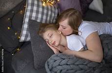 daughter sleeping mum embraces teenager contents comp similar search