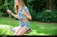 swing girl teenage alamy